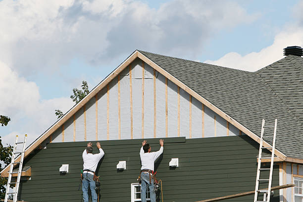 Professional Siding Installation technician working in Baldwin, GA
